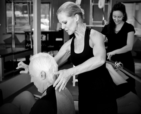 susan hard instructing at pure pilates in Brookside, Kansas City