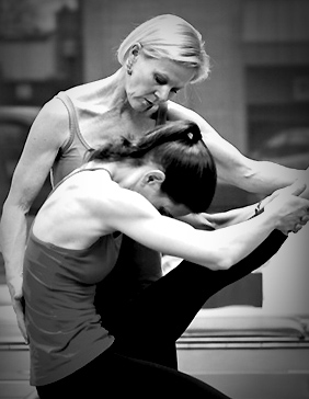 pure pilates instructor with student